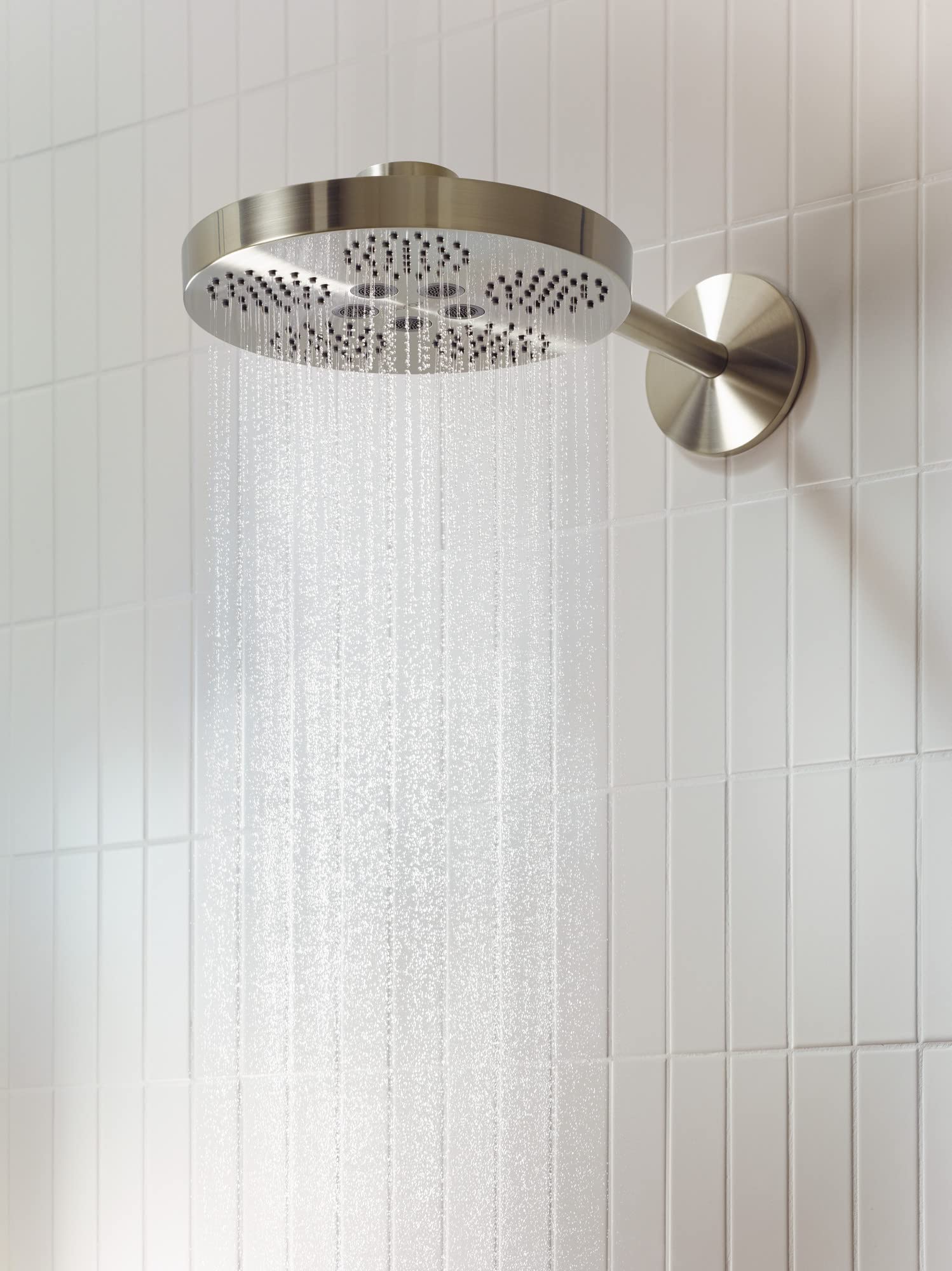Brushed nickel round shower head with 2-jet spray pattern mounted on wall with matching arm trim.