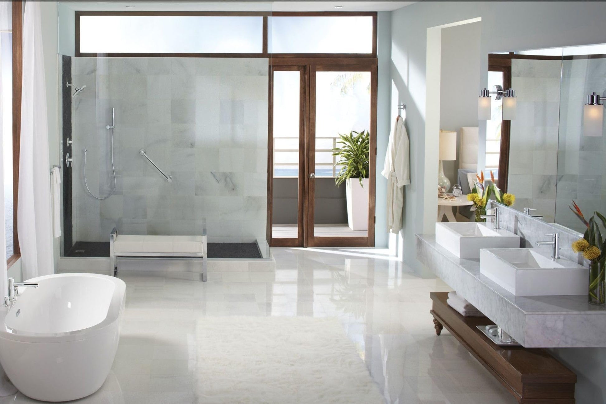 Chrome grab bar mounted horizontally on bathroom wall near shower enclosure.