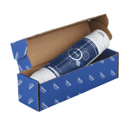 Grohe Blue carbon filter with white end caps in blue and white branded cardboard box with brown interior wrap.