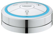 Grohe F-Digital controller with white face, blue ring, chrome finish, and power and temperature control buttons.