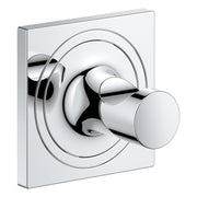 Chrome towel hook with cylindrical knob and square mounting plate, featuring concentric circular design elements.