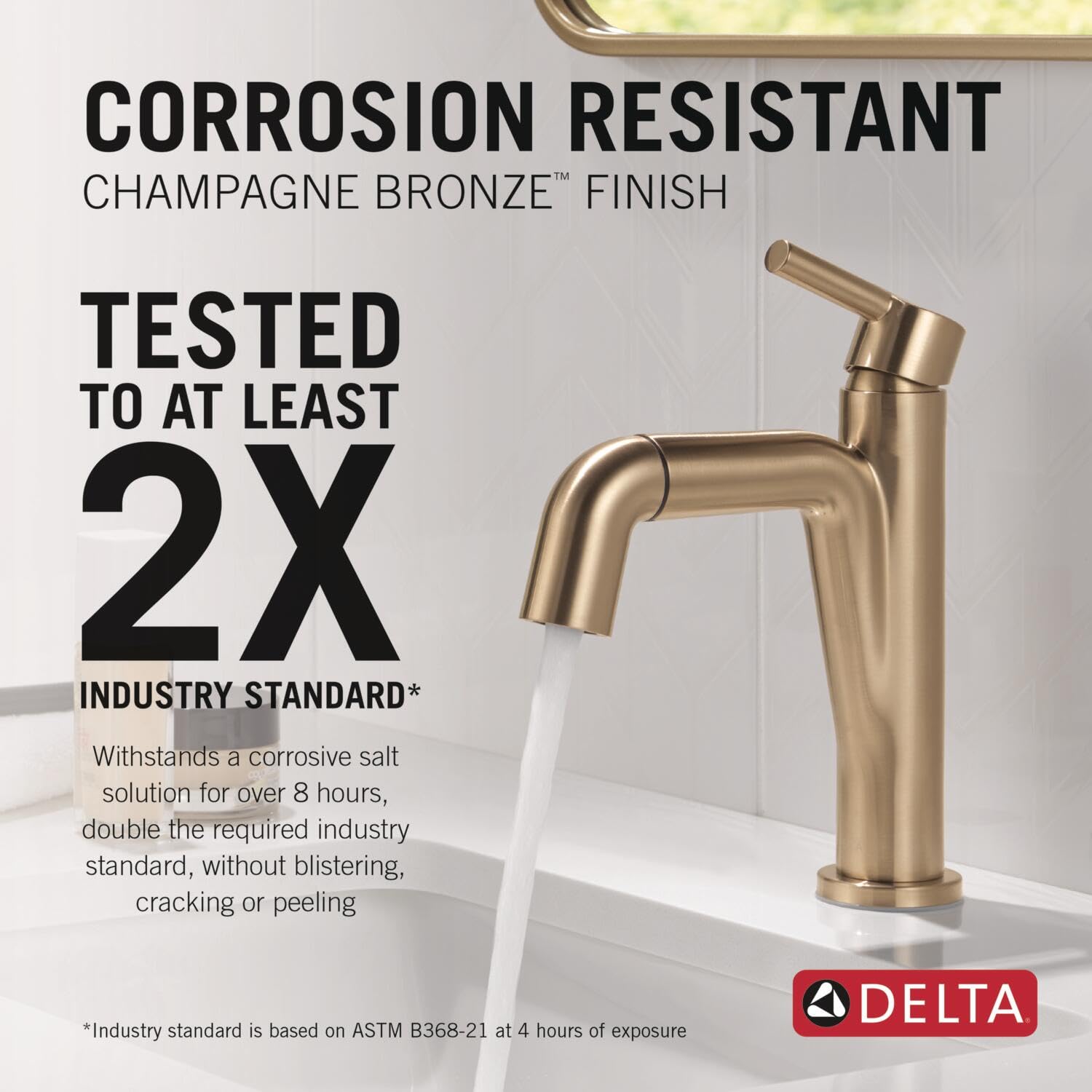 Champagne bronze single handle pull-down bathroom faucet with curved spout and water stream visible.