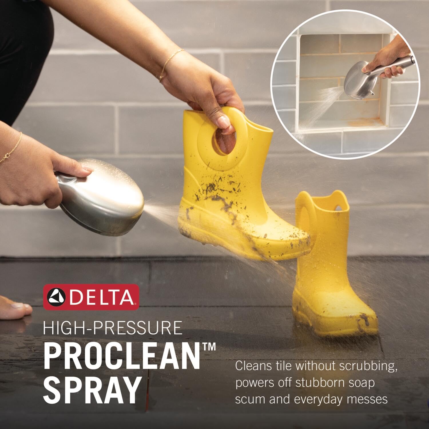 Matte black Delta showerhead with ProClean spray technology demonstrated cleaning a yellow boot with high-pressure water.