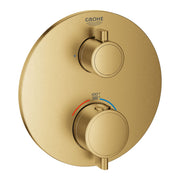 Brushed gold oval valve trim with two round handles, temperature gauge, and small diverter lever.