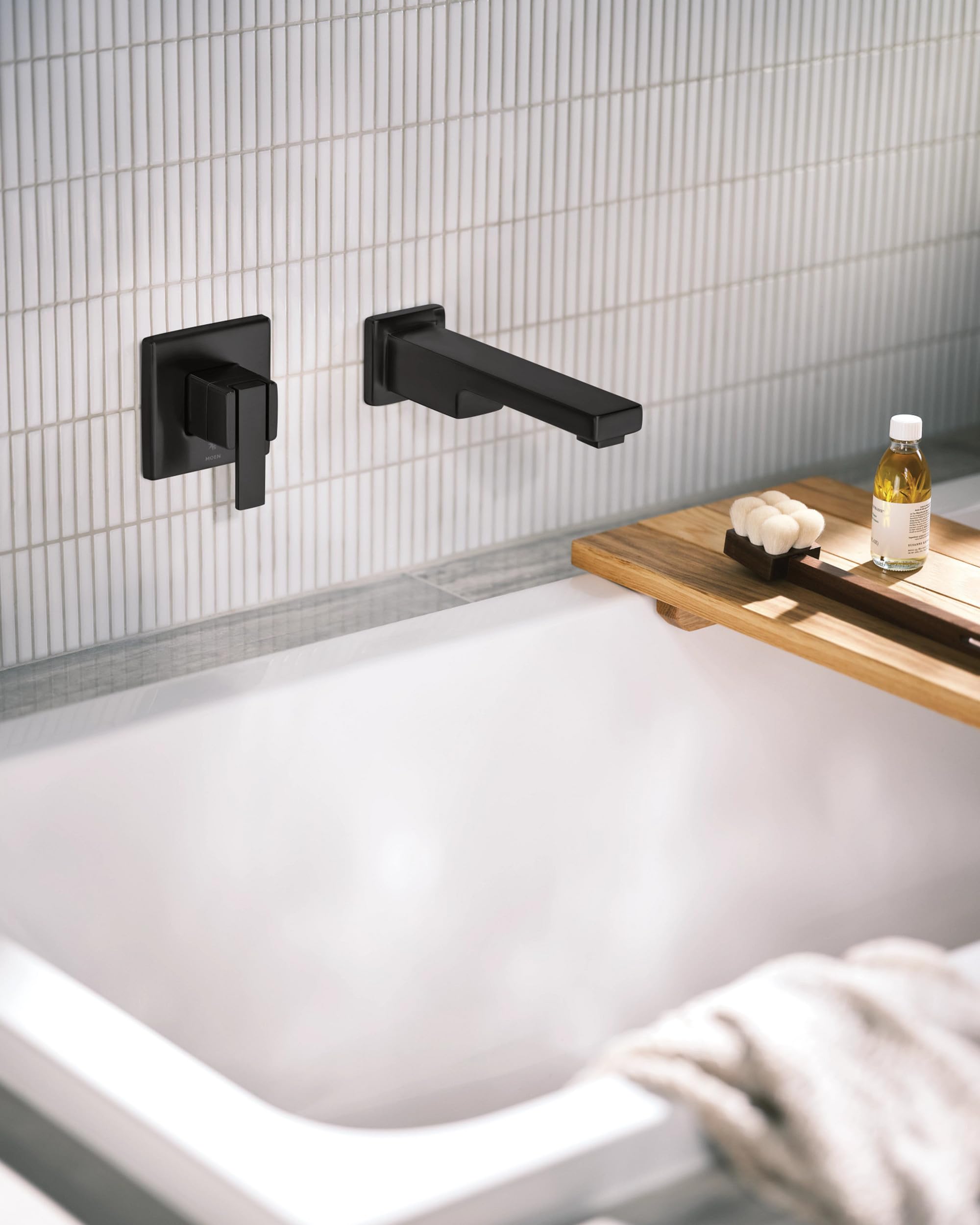Moen 90 Degree Single Handle Wall Mount Tub Filler High Flow Tub Faucet with 10" Spout Reach in Matte Black - WTS911BL