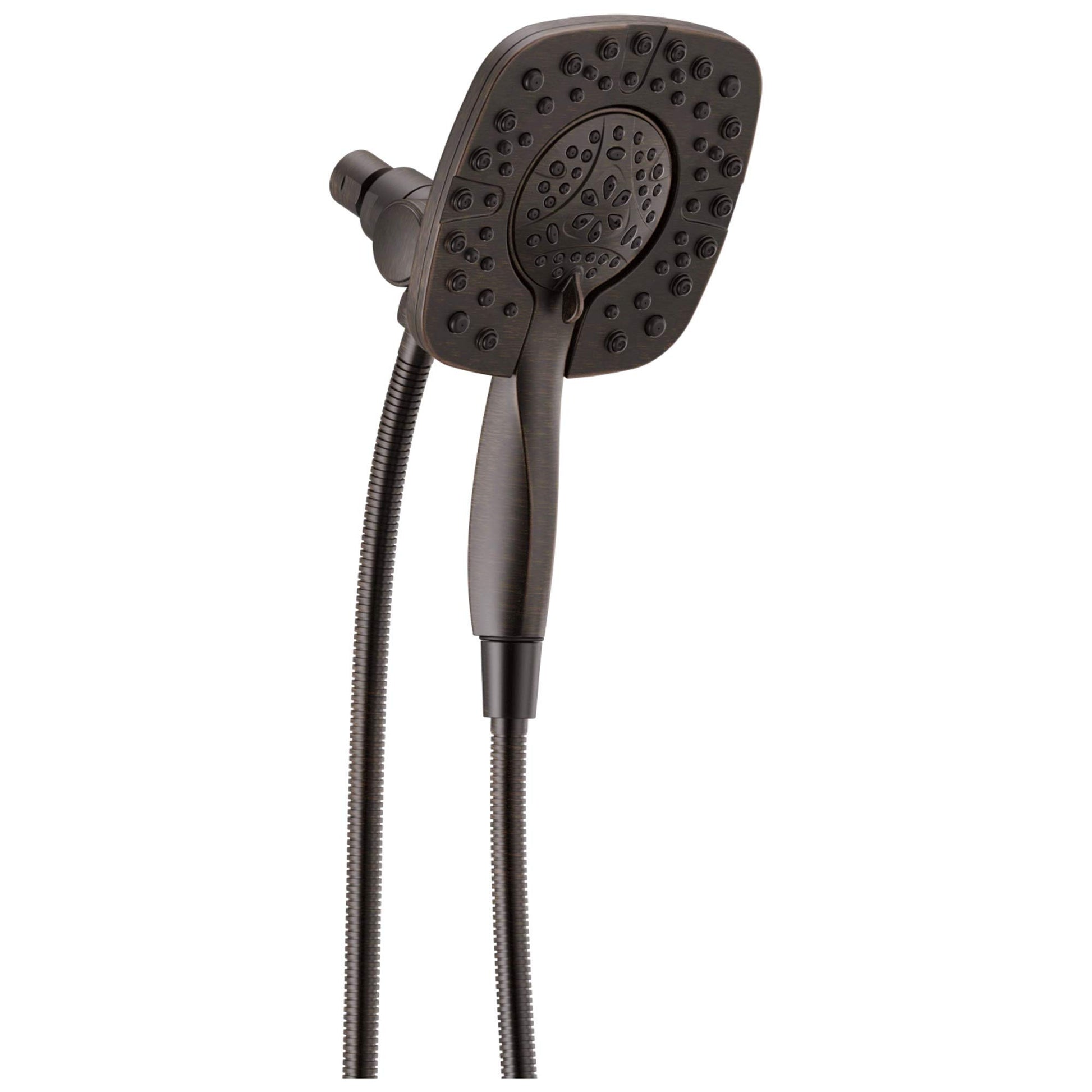 Square bronze shower head with dual water jets and perforated spray pattern attached to flexible hose.