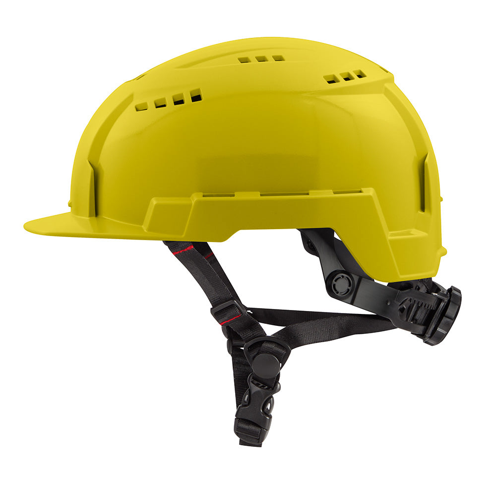 Yellow vented safety helmet with front brim, black chin strap, and ventilation slots on crown.