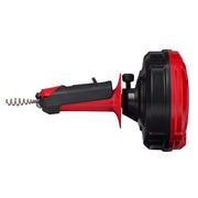 Red and black cable drum auger with spiral bit attachment and grip handle for plumbing drain cleaning.