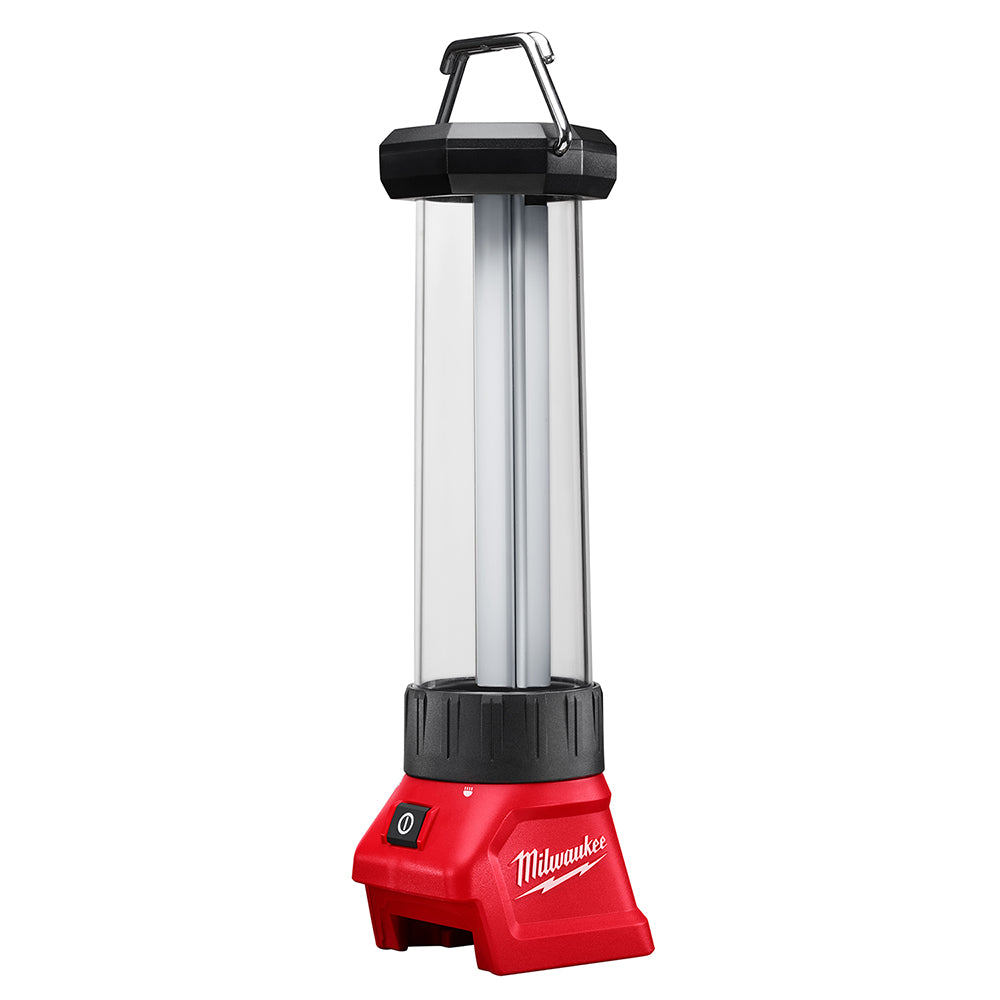 Milwaukee M18 LED lantern with red base, black top handle, clear cylindrical light chamber, and power switch.