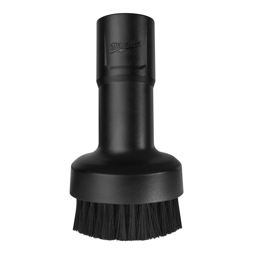 Black round brush attachment with stiff bristles and cylindrical shaft for power tool use.