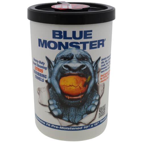Blue Monster brand cylindrical container with black lid and blue monster face graphic holding orange citrus fruit.