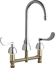 Chrome and brass two-handle gooseneck faucet with lever handles and deck-mounted base.