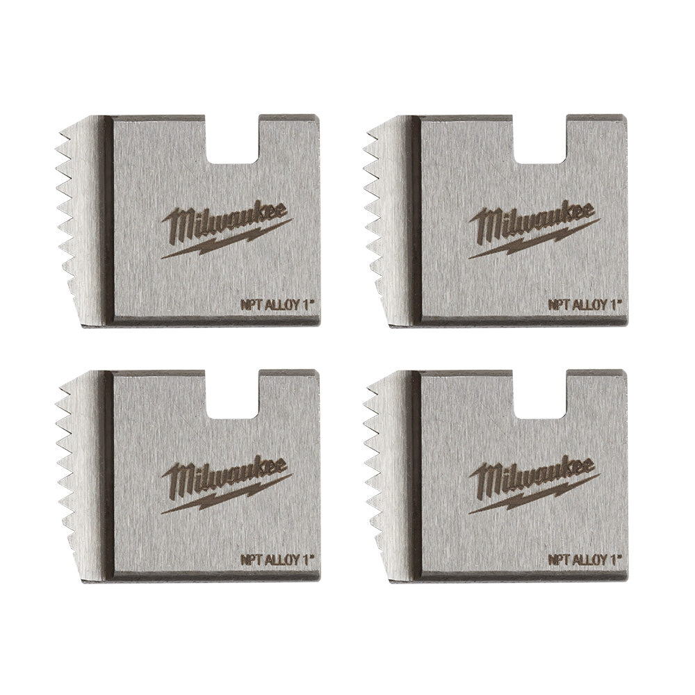 Four metal dies with serrated cutting edges marked "Milwaukee" and "NPT ALLOY 1" for pipe threading.