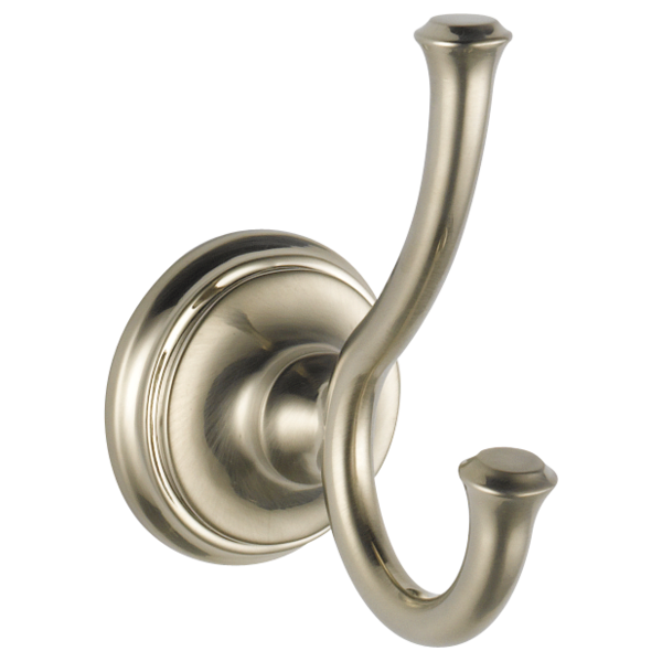 Brushed nickel double robe hook with curved hooks mounted on circular wall plate.