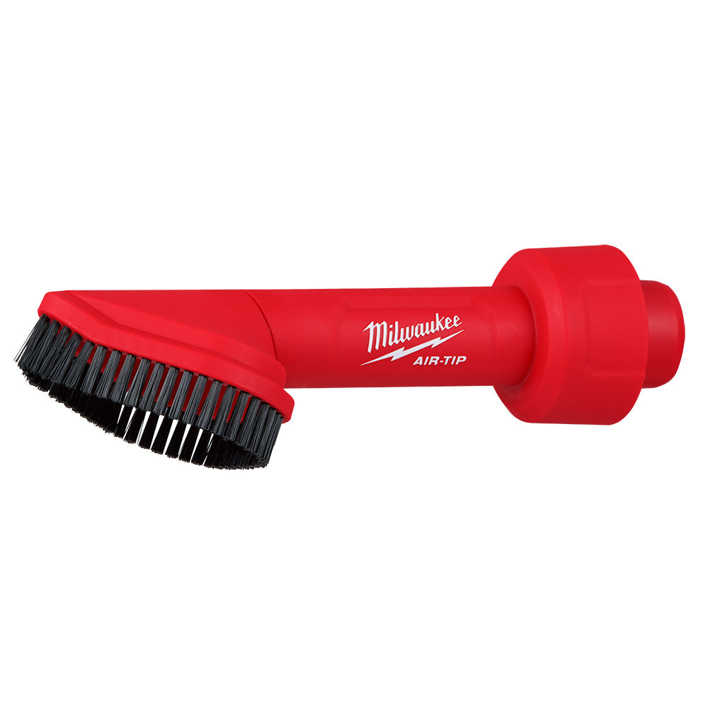 Red Milwaukee AIR-TIP rotating corner brush tool with black bristles and cylindrical attachment head.