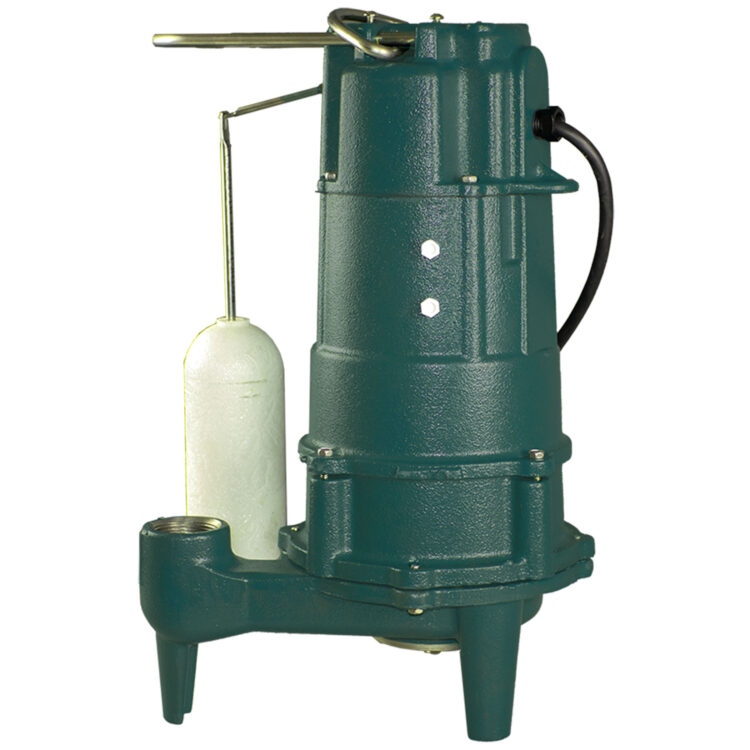 Zoeller N807 cast iron grinder pump in green with white float switch and discharge pipe.