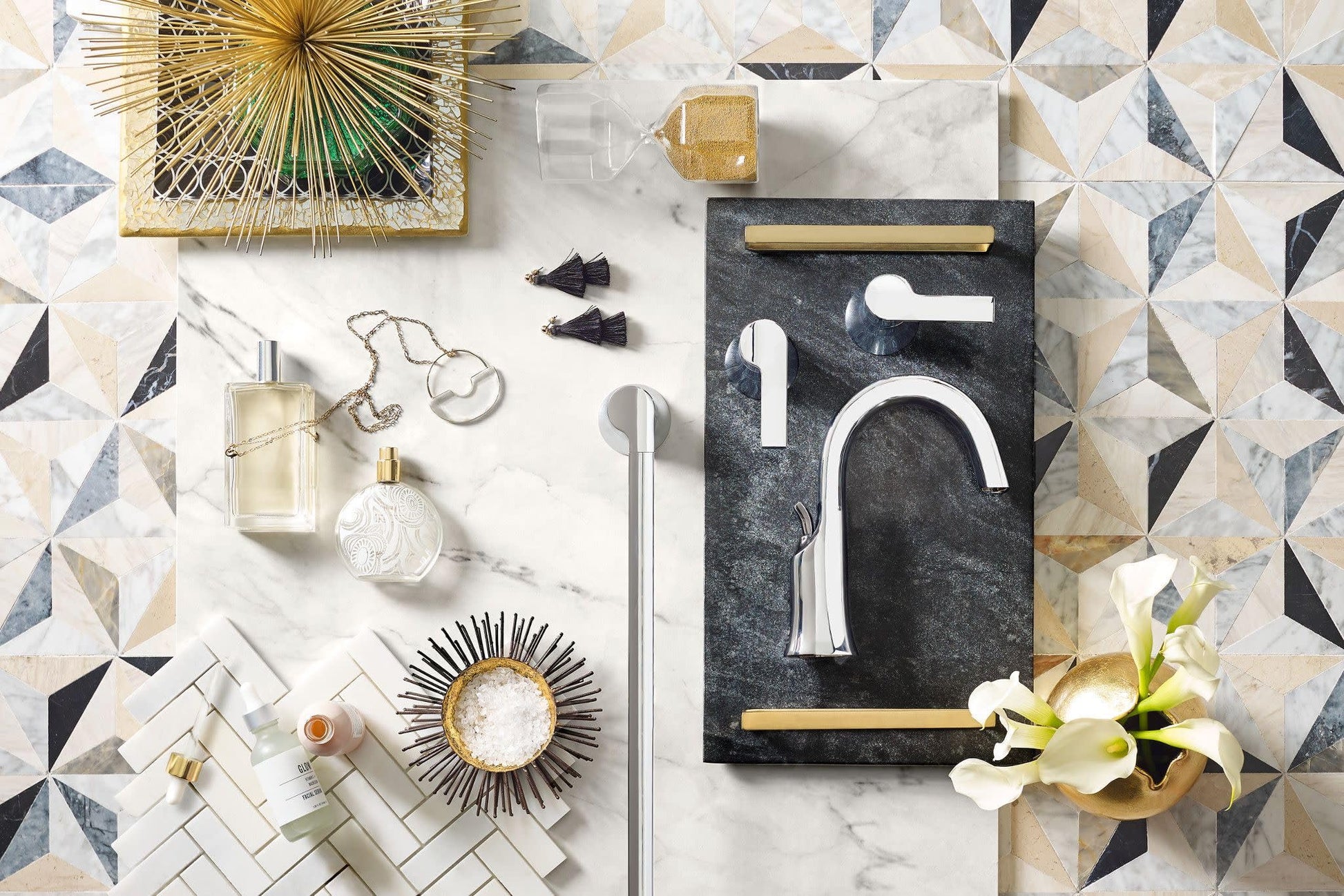 Chrome two-handle bathroom faucet with lever handles and 8-inch widespread mounting.