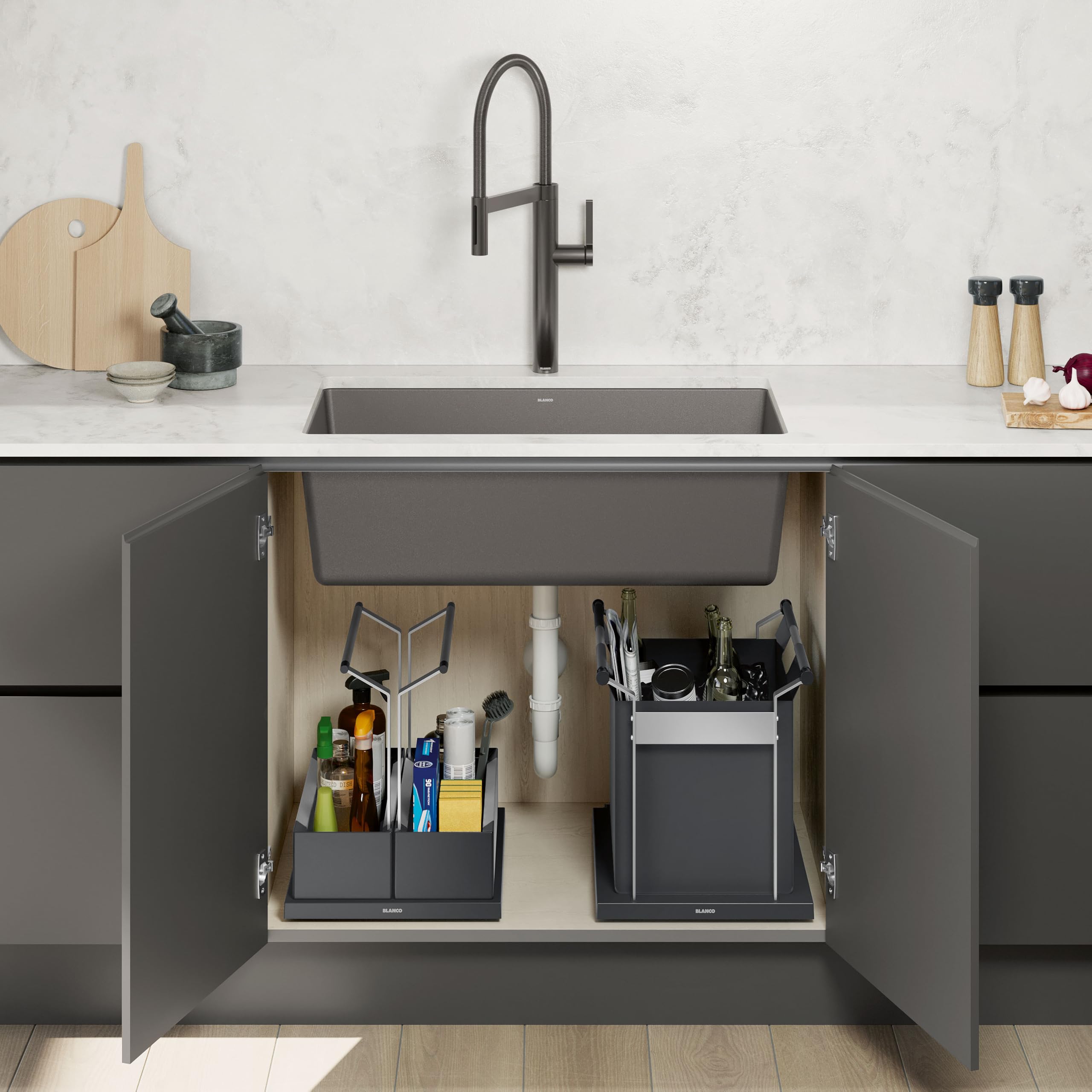 Black Blanco Universal Storage Bag XL organizer displayed in under-sink cabinet with cleaning supplies and kitchen utensils.