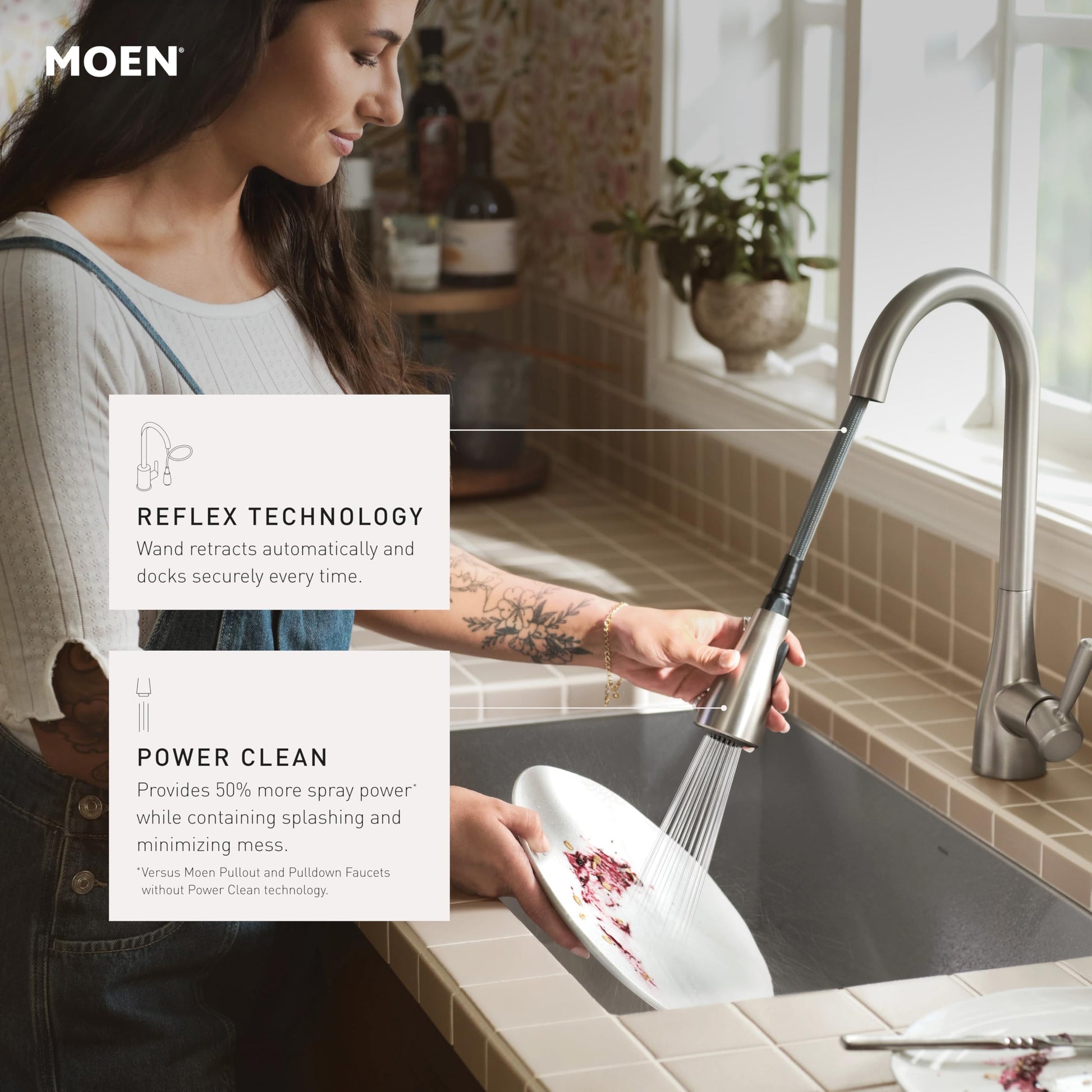Chrome pulldown kitchen faucet with curved spout and single handle over white sink basin.