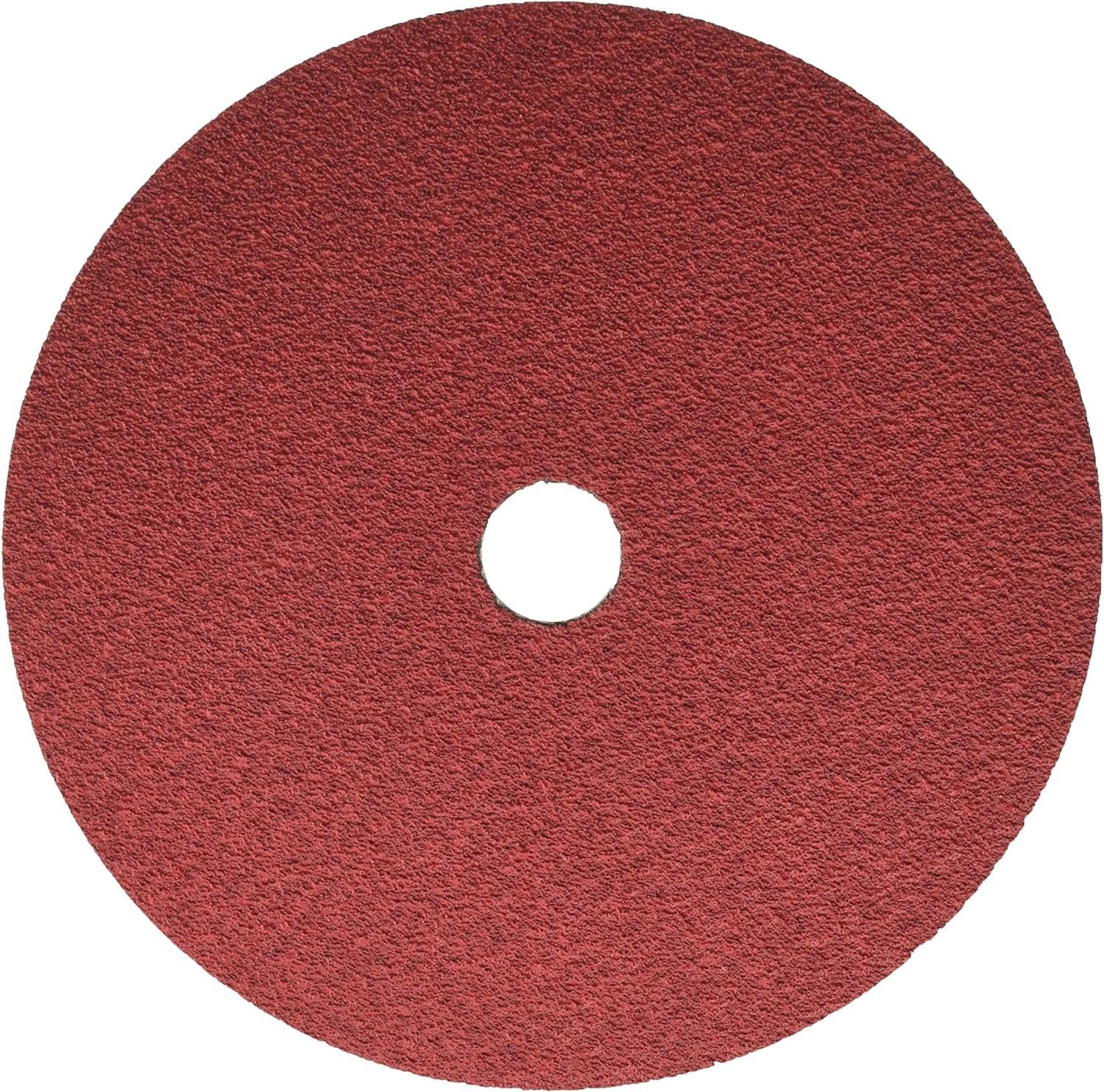 Red abrasive sanding disc, 7 inches diameter, with center hole for mounting.