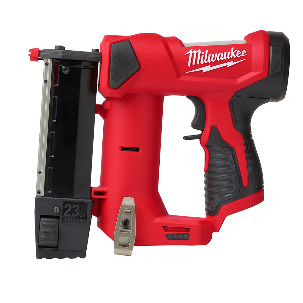 Red and black Milwaukee M12 cordless pin nailer with magazine, trigger, and grip visible against white background.
