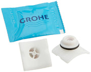 Grohe non-return valve repair parts kit containing blue packaging, white plastic component with internal mechanism, and white