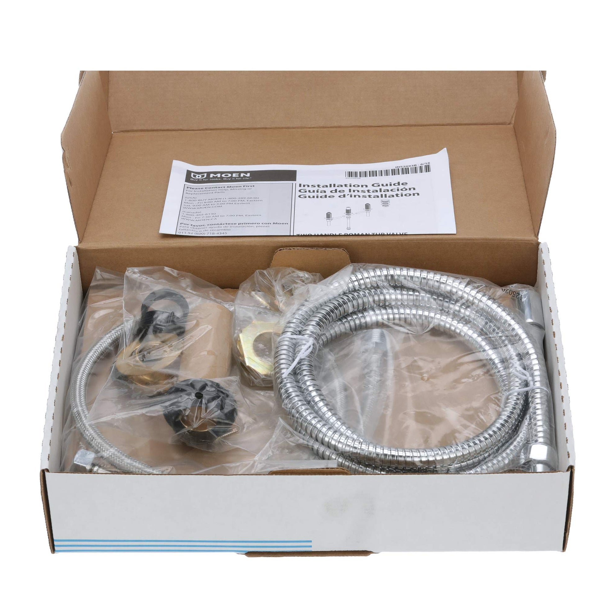 Moen two-handle roman tub valve with shower diverter, chrome finish hose, and installation guide in cardboard box.