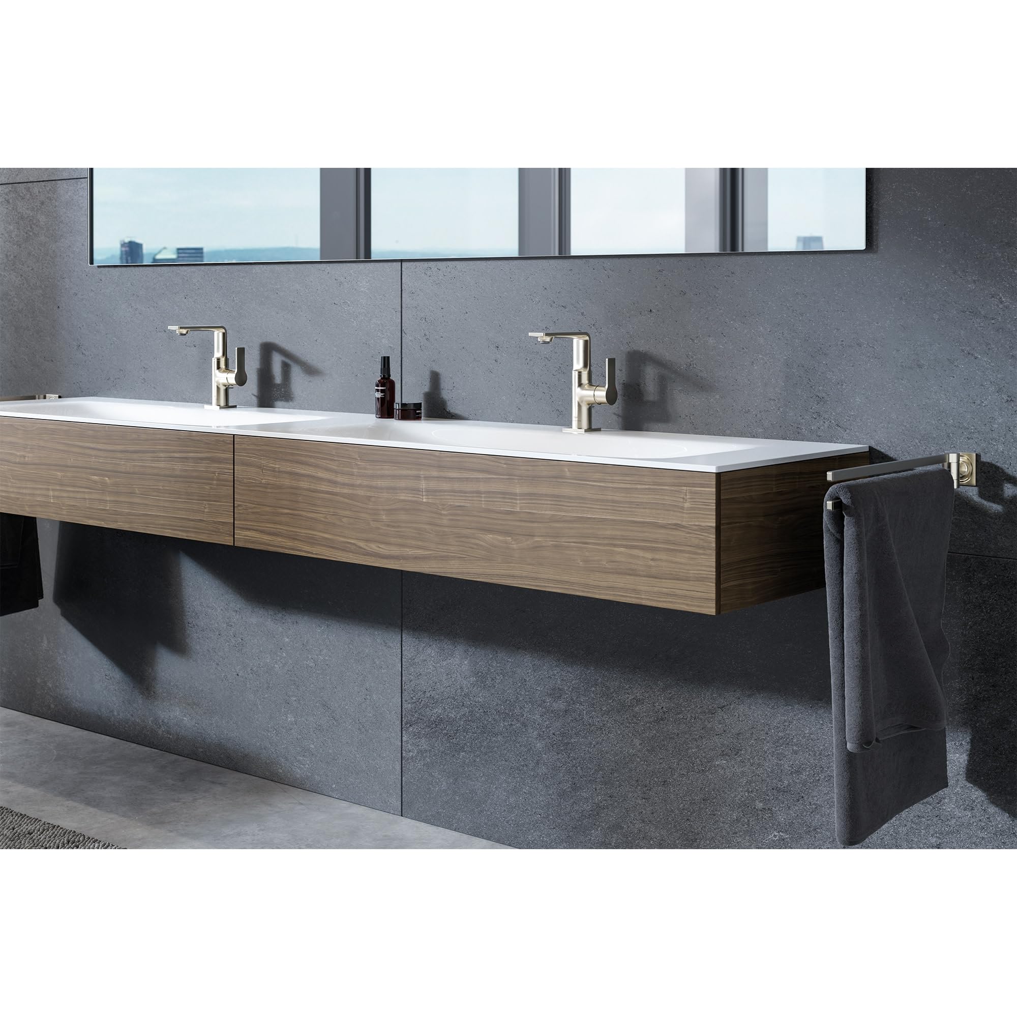 Brushed nickel double towel bar mounted on gray bathroom wall beside floating wooden vanity.