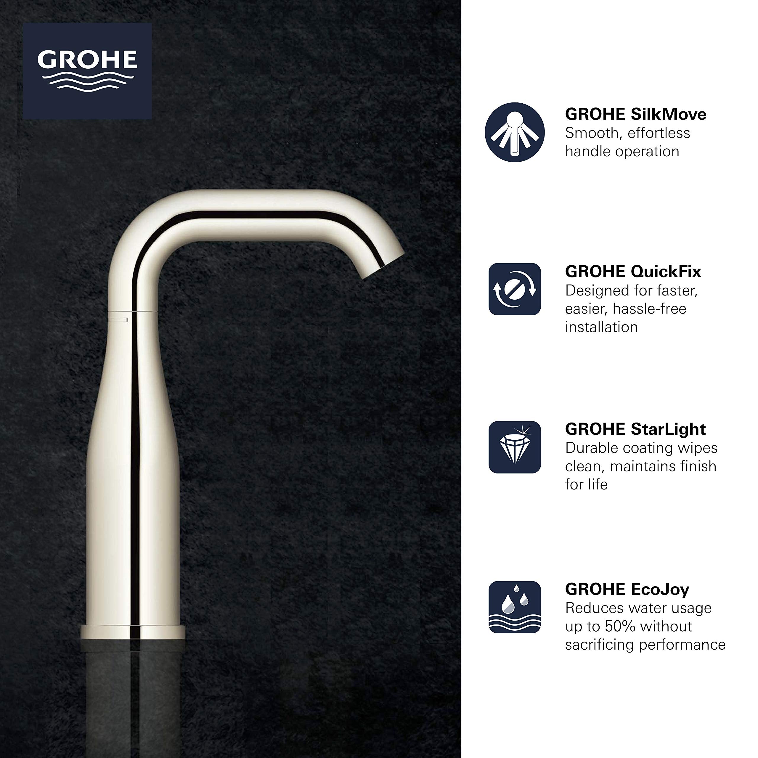 Matte black single-handle bathroom faucet with curved spout and black base on dark textured surface.