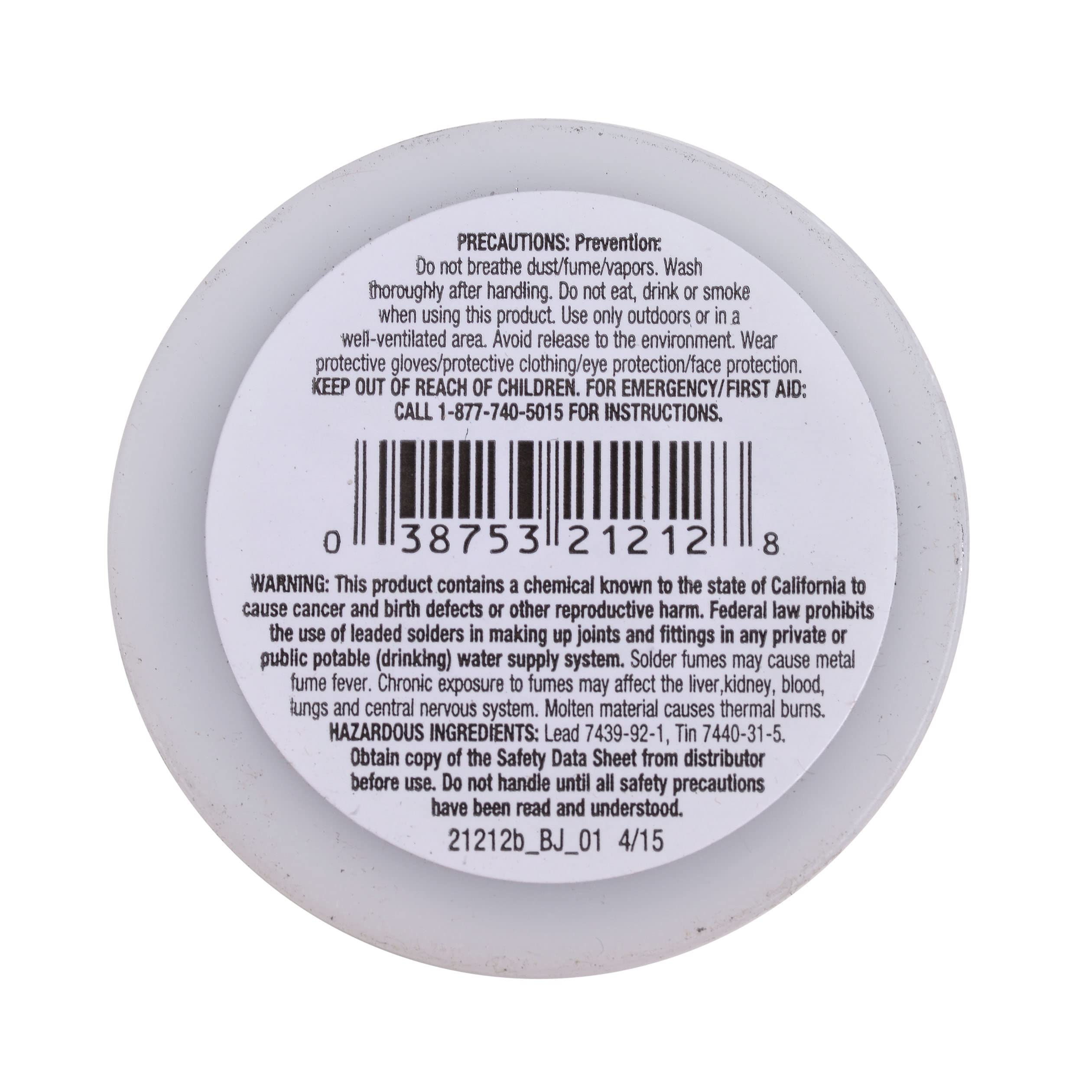 Gray spool of rosin core plumbing solder with safety and warning labels on the label.