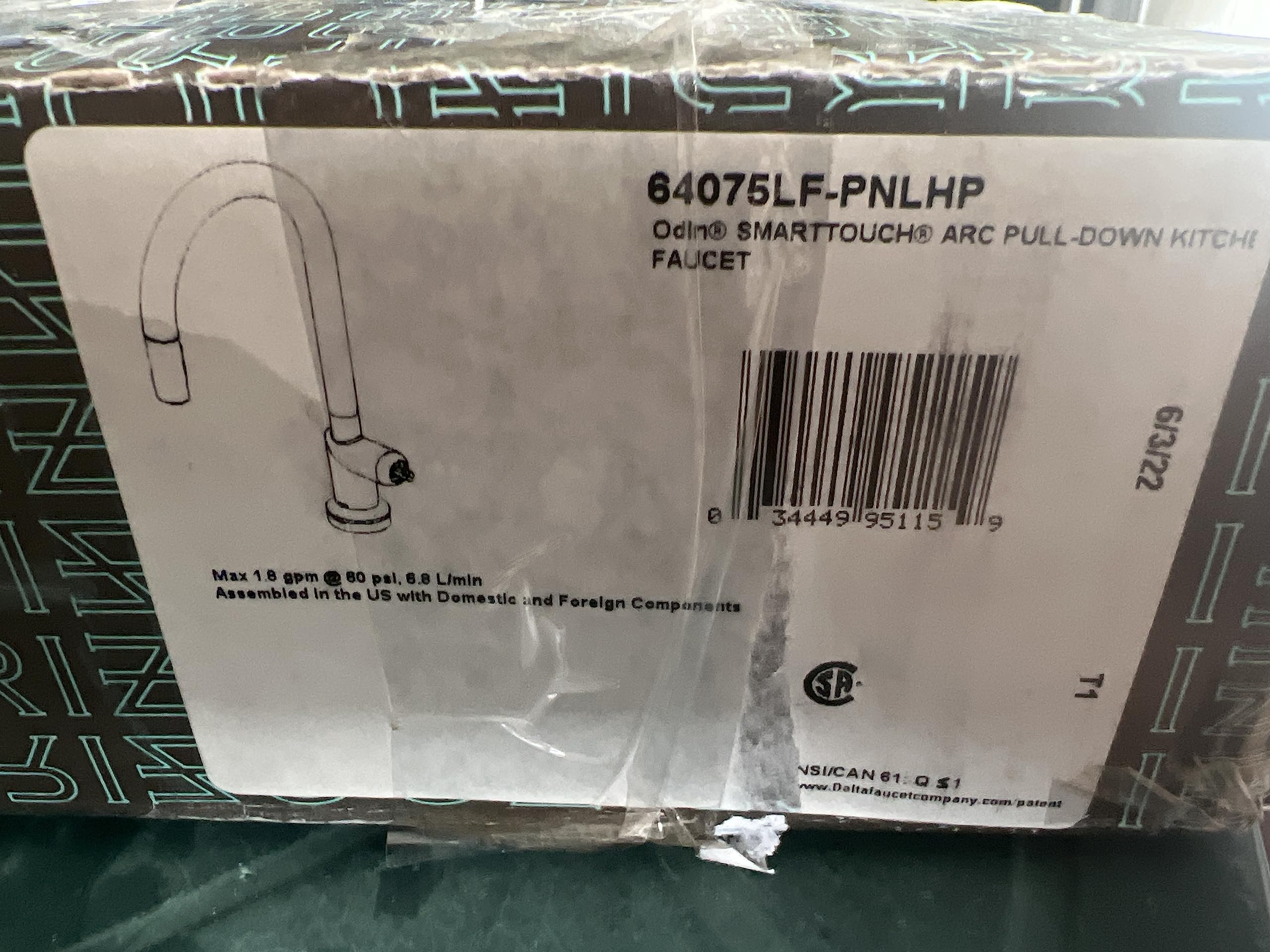 Polished nickel pull-down kitchen faucet with arched spout and touchless activation in retail packaging.