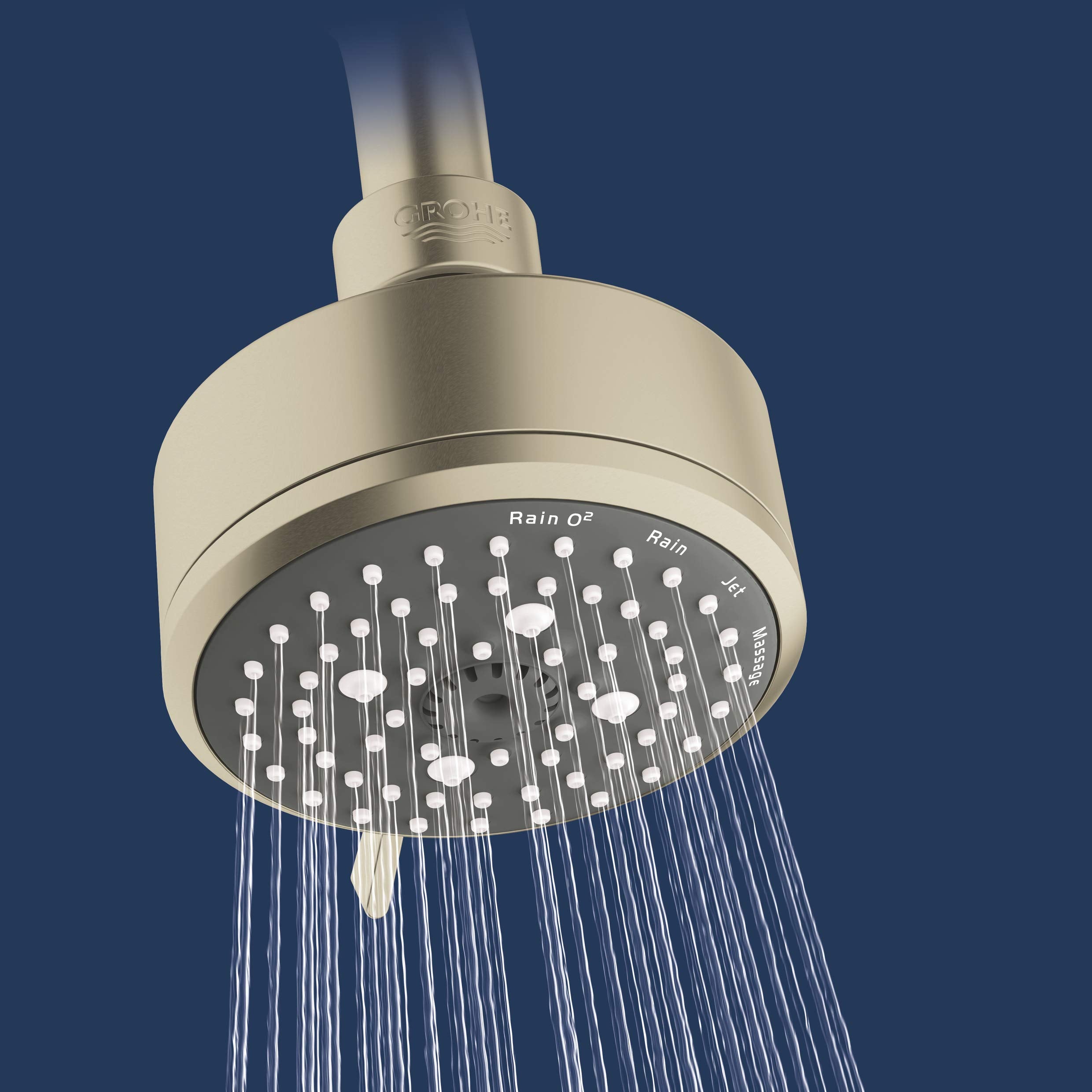 Brushed nickel round showerhead with multiple spray jets and overhead arm connection, water streams visible below.