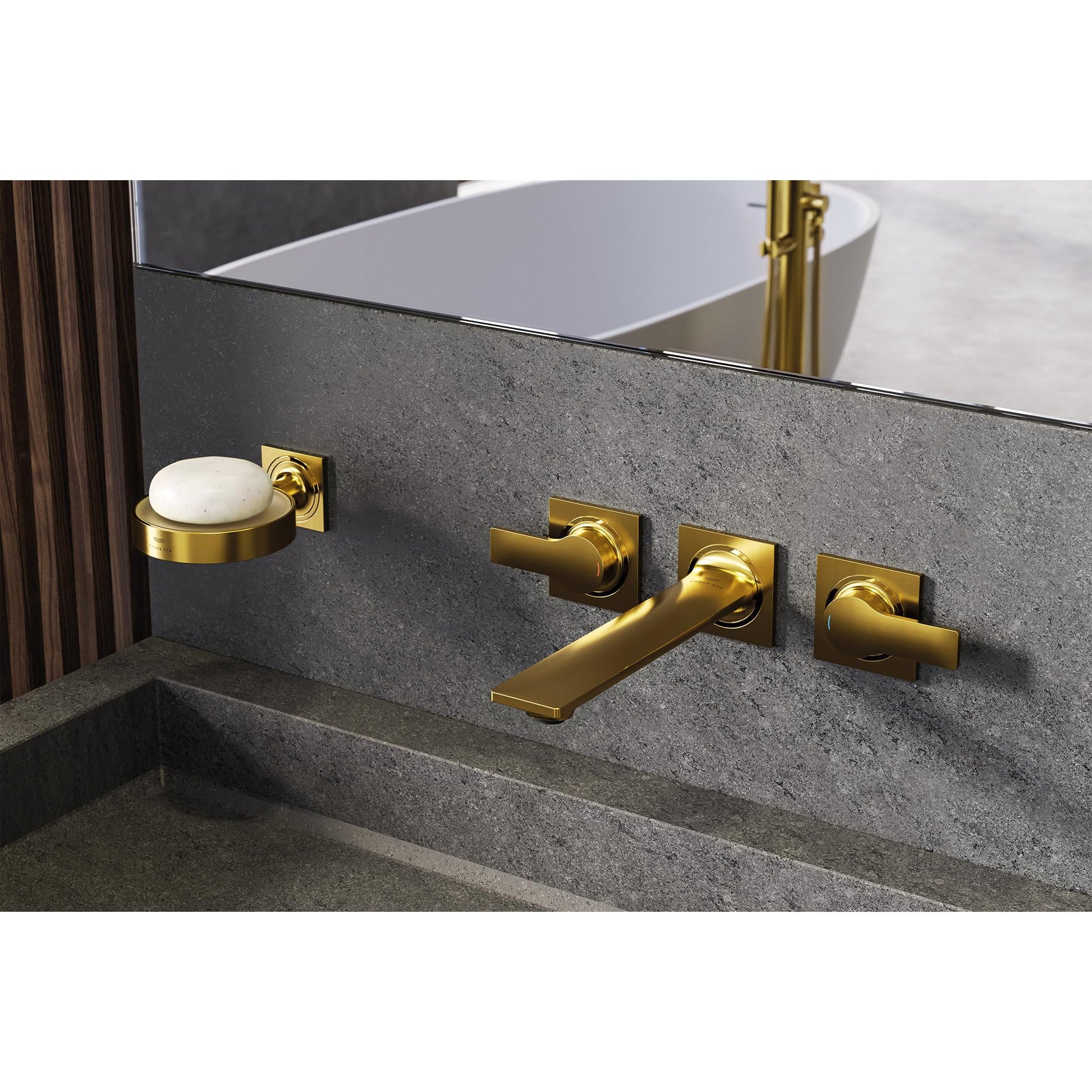 Wall-mounted brass faucet with two handles and extended spout installed on dark gray stone sink surround.