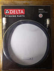 Delta RP80522 hose assembly with braided tubing and threaded connectors on packaging.