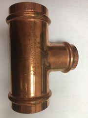 Copper press tee fitting with three connection points and embossed manufacturer markings on the surface.