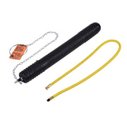 Black test-ball plug with ribbed grip, metal chain with orange tag, and yellow hose attachment.