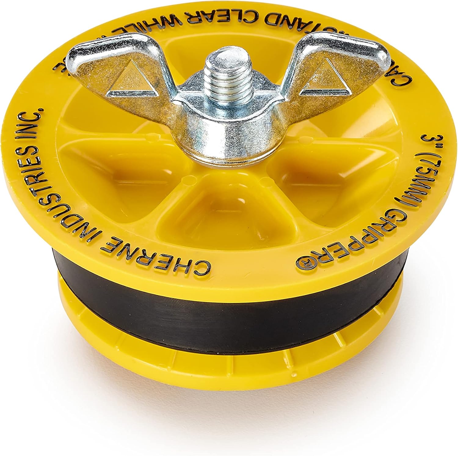 Yellow mechanical pipe gripper plug with metal wing clamps and central screw, black rubber band around base.
