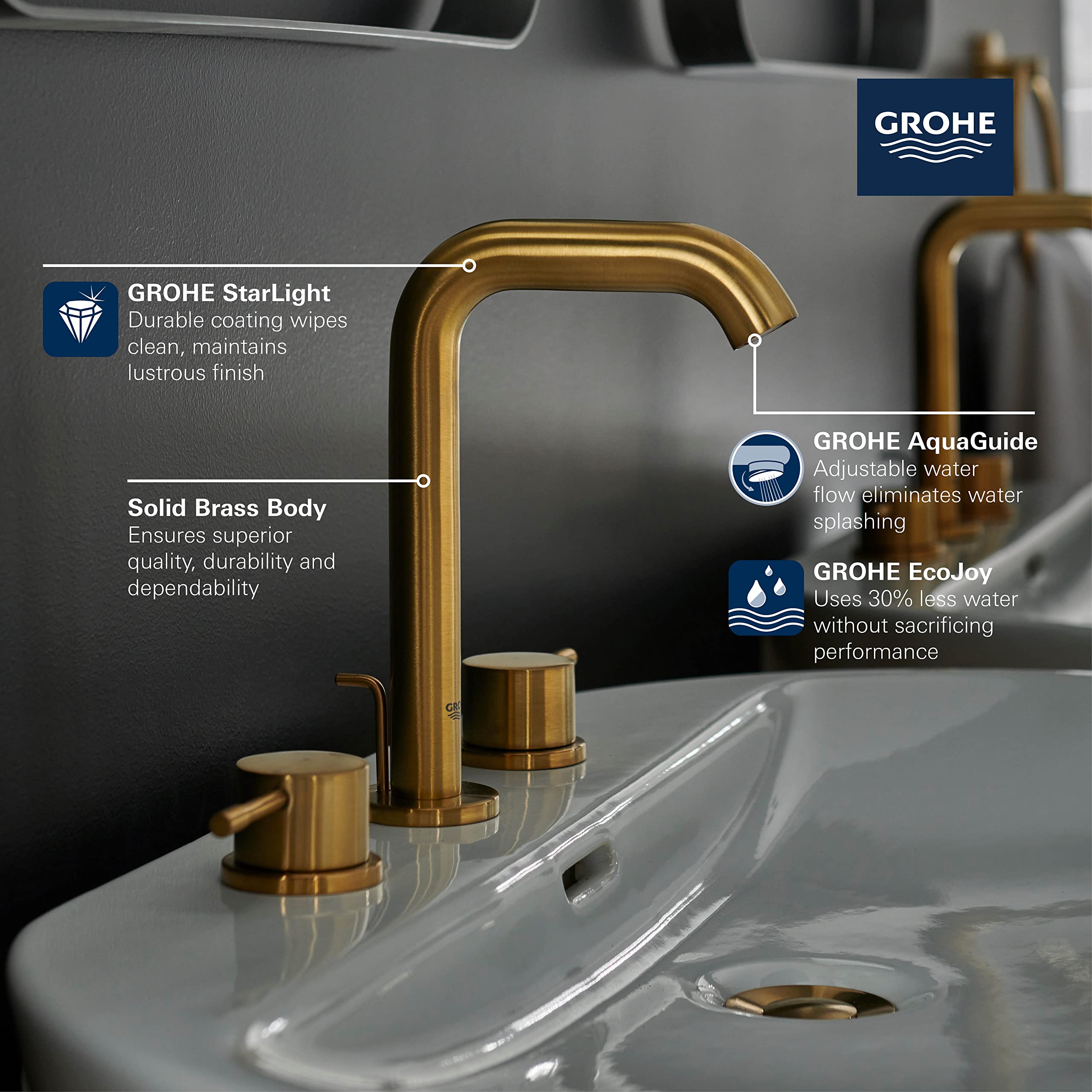 Grohe Essence brushed gold widespread bathroom faucet with high arc spout and two cylindrical handles mounted on sink.