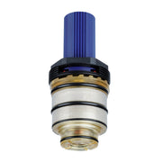 Grohe Turbostat cartridge with blue ribbed cap, black threads, brass and mesh filter components stacked vertically.