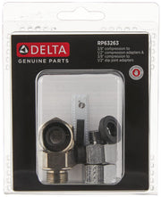 Delta RP63263 adapter kit with brass compression fitting and black plastic slip joint adapter in blister packaging.