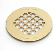 Polished brass circular shower drain trim ring with diamond-pattern perforations and Oatey branding.