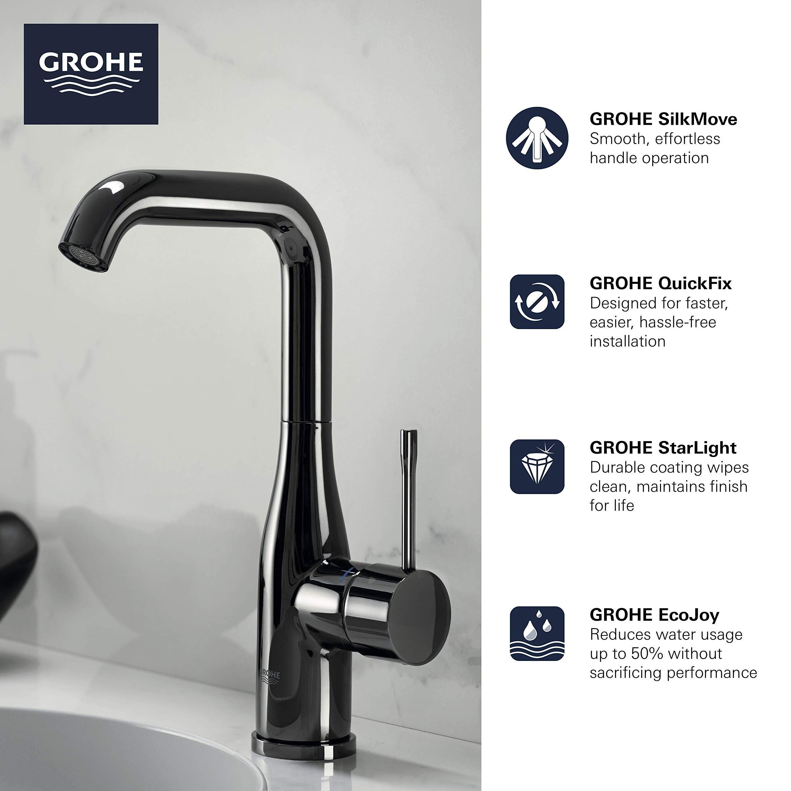 Grohe Essence single-handle bathroom faucet in hard graphite with curved spout and cylindrical handle on marble countertop.