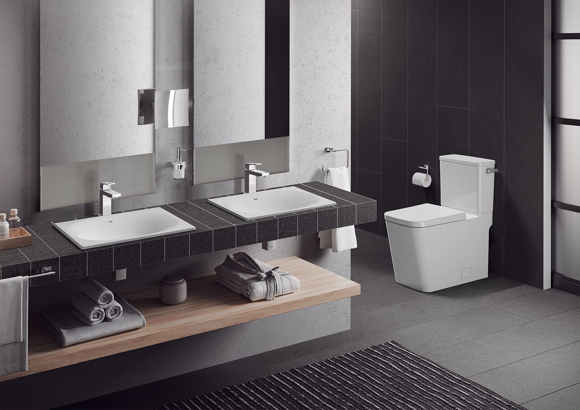 White elongated toilet with seat and right-hand trip lever in modern bathroom setting.