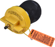 Yellow pneumatic plug with black inflatable seal, brass inlet valve, and orange warning tag attached.