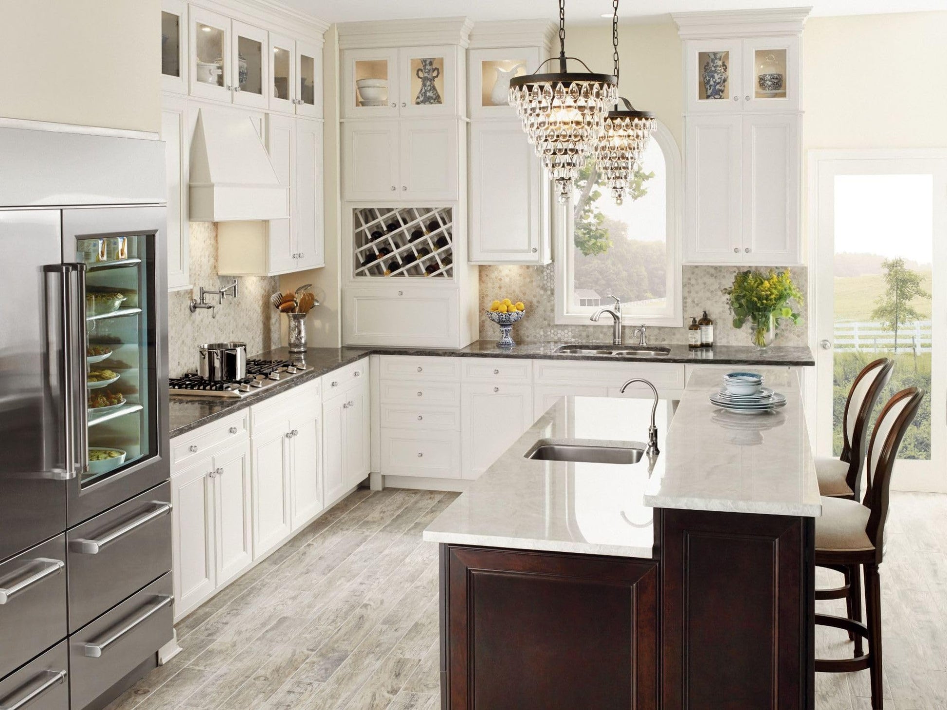 Chrome cold water beverage faucet with curved spout mounted on kitchen island countertop.