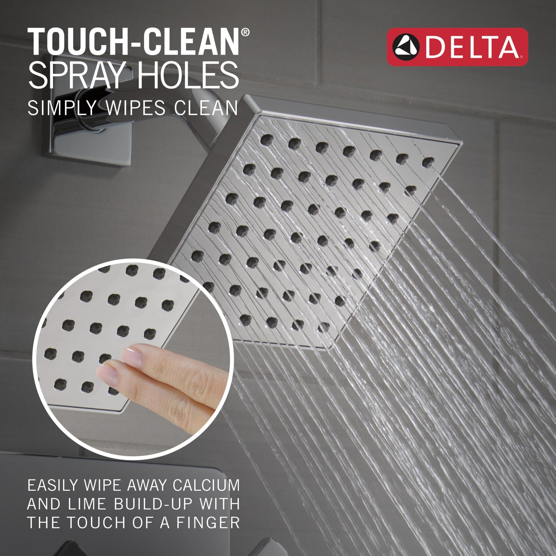 Chrome square shower head with multiple spray holes and vertical linear design pattern.
