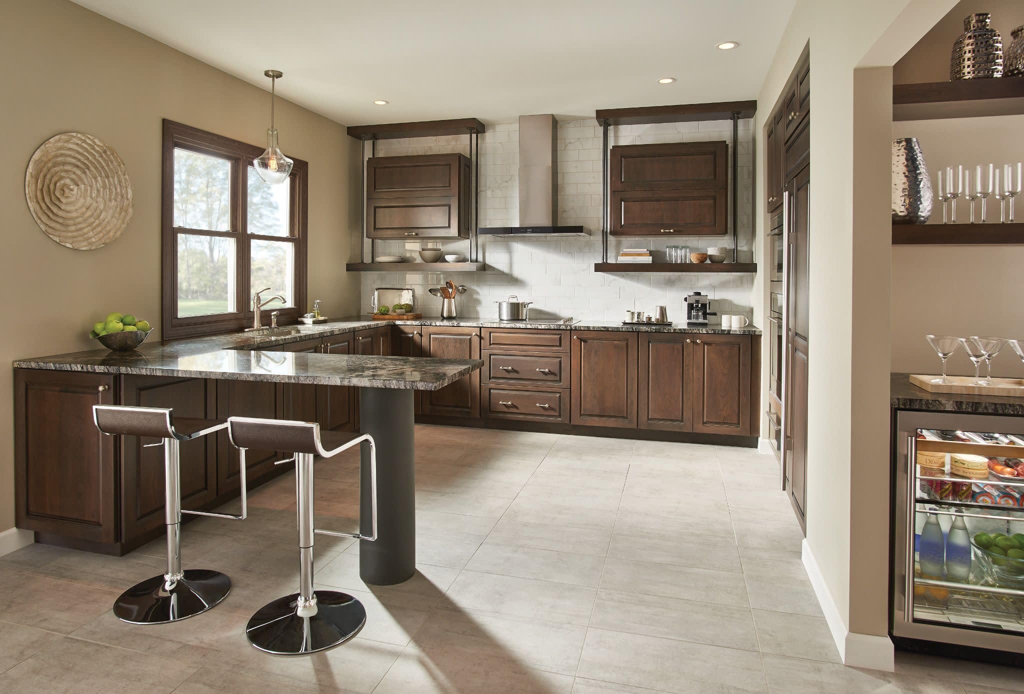 Stainless steel kitchen faucet with high arc spout, single handle, and side spray mounted on countertop.