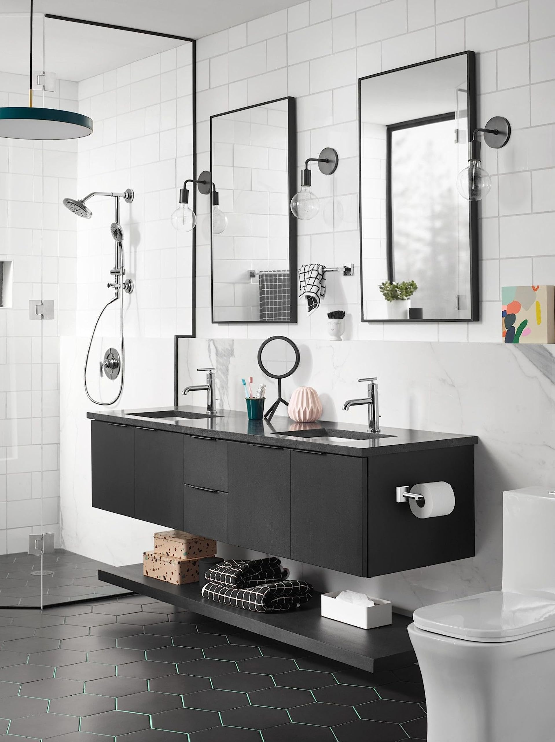 Matte black towel bar mounted horizontally on bathroom wall above vanity sink.