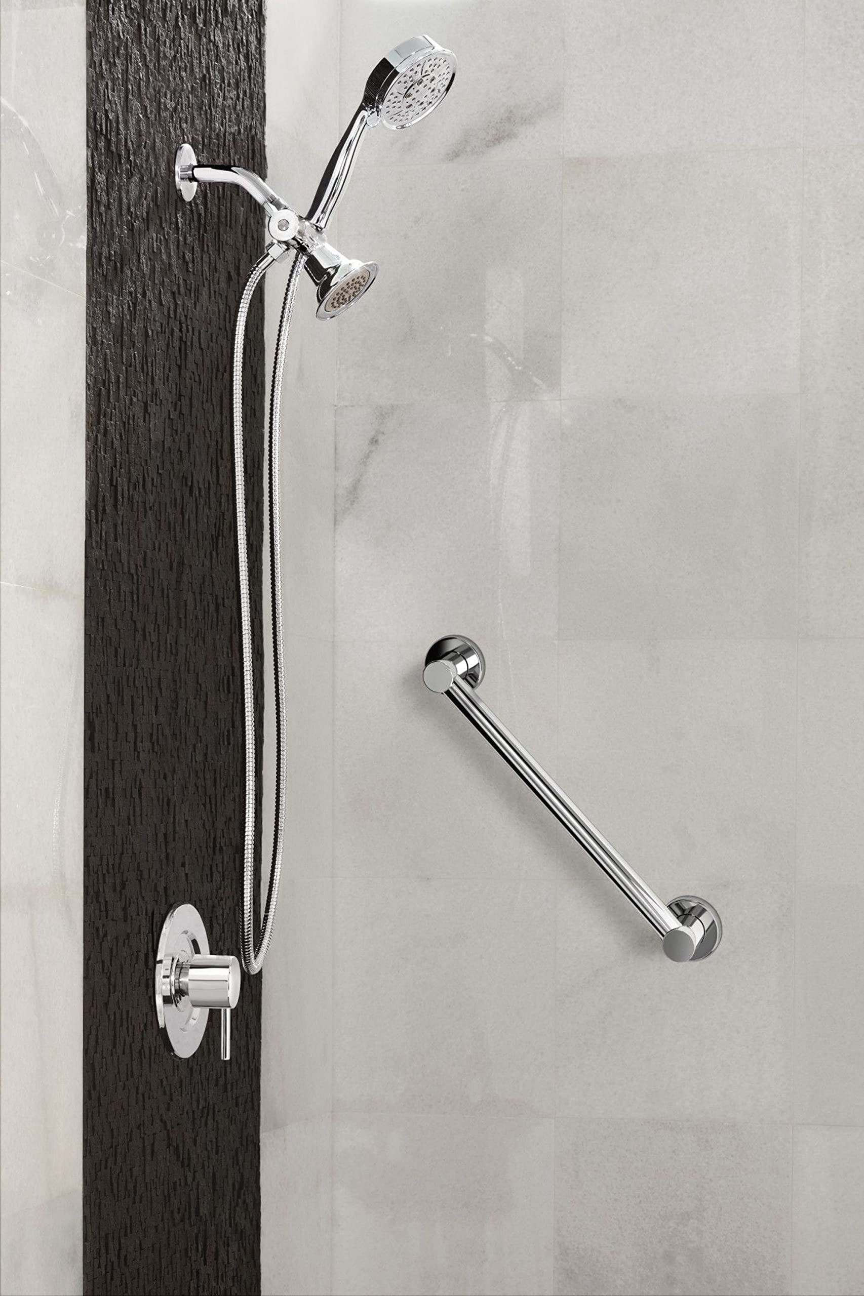 Chrome single towel bar mounted horizontally on bathroom wall next to shower fixtures.