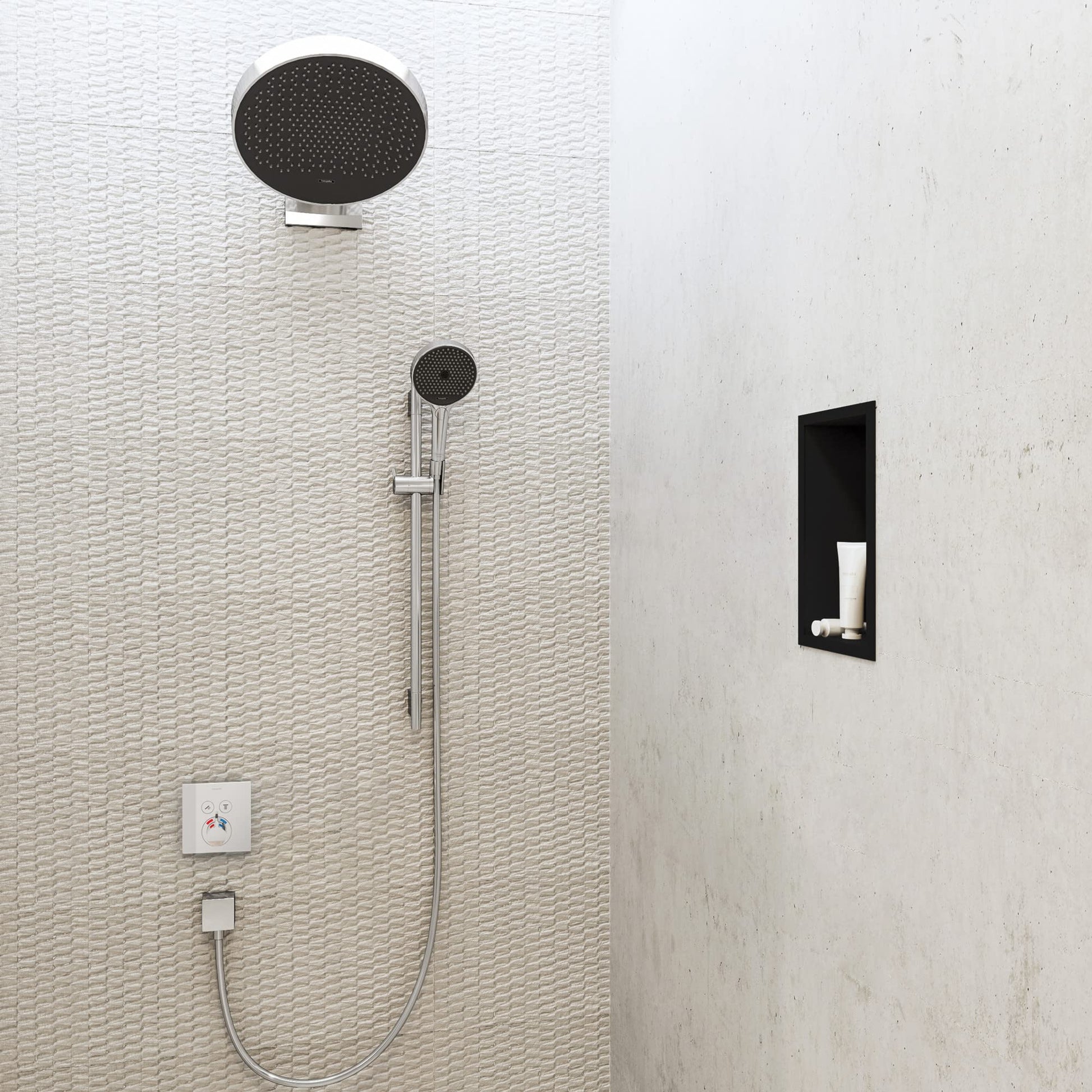 Matte black rectangular wall niche with integrated frame mounted on white tile wall, displaying a white item inside.